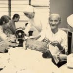 Sisters and the residents working together in the sewing room.